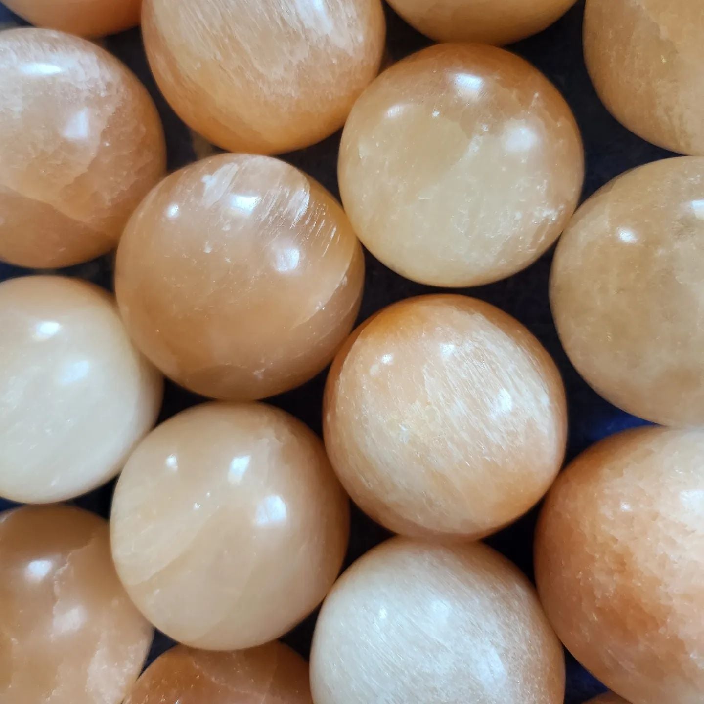 peach selenite spheres